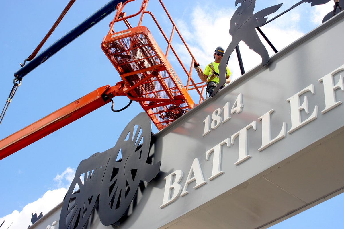 Todd Groulx, a worker with Black Creek Metal, makes some adjustments to a figure of an 1812-era soldier. The figure is part of a sign installed Thursday over Lundy’s Lane. It’s part of the city’s effort to commemorate the bicentennial of the 1814 Battle of Lundy’s Lane. Photo: Corey Larocque